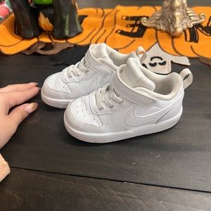 Two Nike Boys Shoes